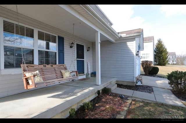 9648 Fallshill Cir, Springfield Twp, OH 45231 - view of exterior entry with a porch