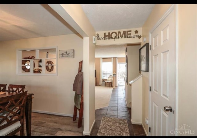 9648 Fallshill Cir, Springfield Twp, OH 45231 - corridor with baseboards and tile patterned floors