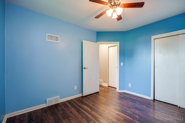 732 Central Ave, Carlisle, OH 45005 - unfurnished bedroom featuring wood finished floors, a closet, and a ceiling fan