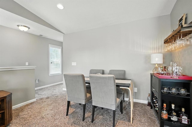 7981 Oakbridge Way, Green Twp, OH 45248 - dining space featuring vaulted ceiling and carpet floors
