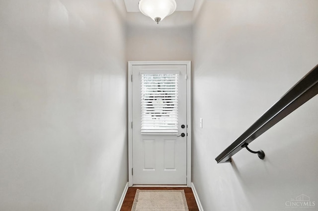 7981 Oakbridge Way, Green Twp, OH 45248 - entryway featuring baseboards and dark wood-type flooring