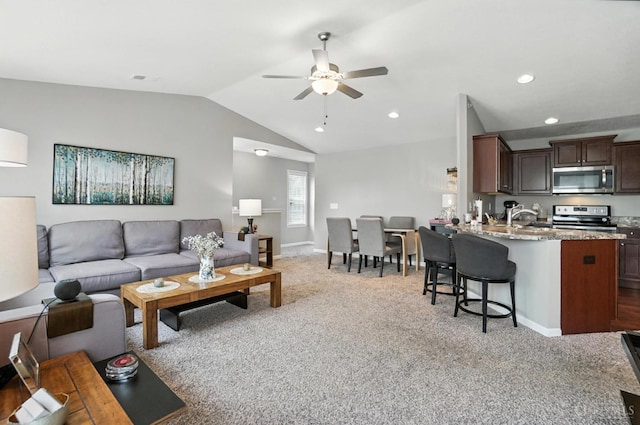 7981 Oakbridge Way, Green Twp, OH 45248 - carpeted living area with ceiling fan, lofted ceiling, and recessed lighting