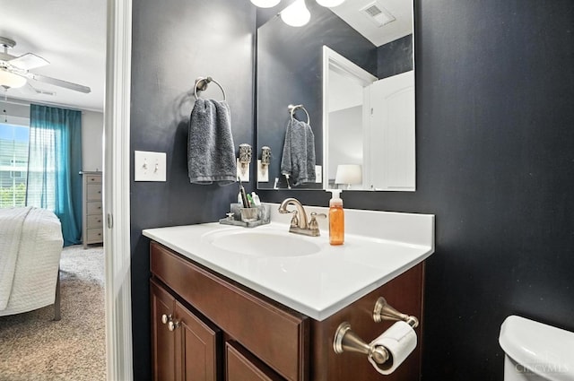 7981 Oakbridge Way, Green Twp, OH 45248 - bathroom with vanity, ceiling fan, and connected bathroom