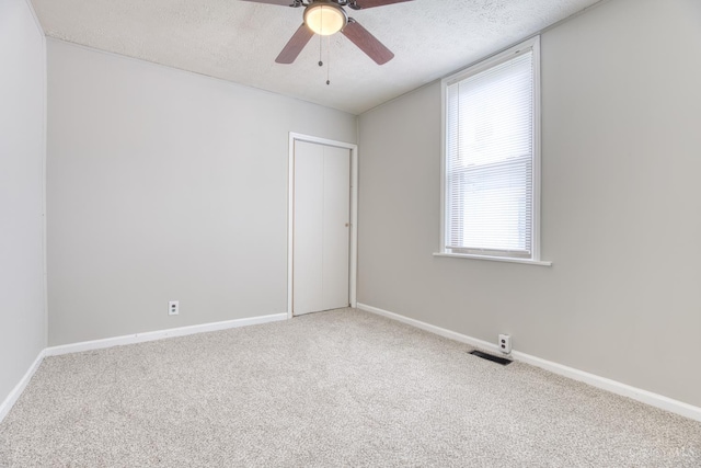 2315 Elbe Ave, Hamilton, OH 45015 - carpeted empty room with ceiling fan and a textured ceiling