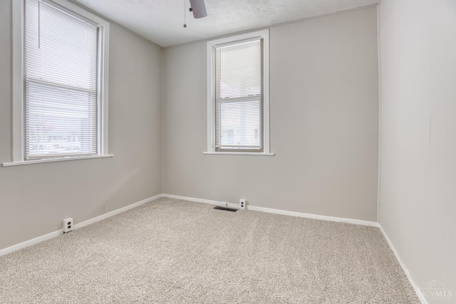 2315 Elbe Ave, Hamilton, OH 45015 - carpeted empty room featuring a ceiling fan and a textured ceiling