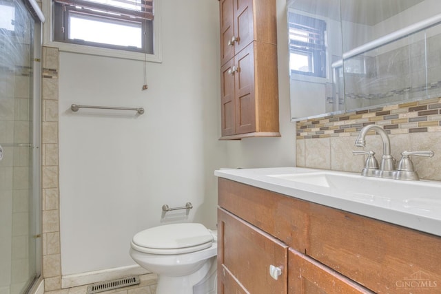 2315 Elbe Ave, Hamilton, OH 45015 - full bath with healthy amount of natural light, vanity, a stall shower, and backsplash