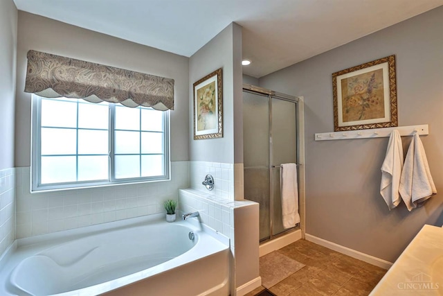 4623 Steeplechase Dr, Batavia Twp, OH 45103 - bathroom featuring a bath and a shower stall
