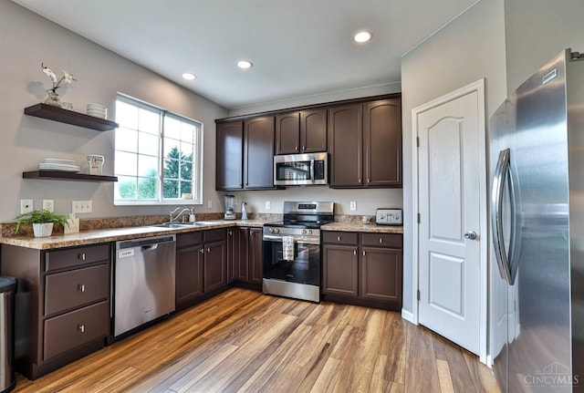 4623 Steeplechase Dr, Batavia Twp, OH 45103 - kitchen with appliances with stainless steel finishes, dark brown cabinetry, light wood-type flooring, recessed lighting, and open shelves