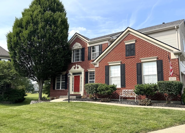 4623 Steeplechase Dr, Batavia Twp, OH 45103 - view of front facade with brick siding and a front lawn