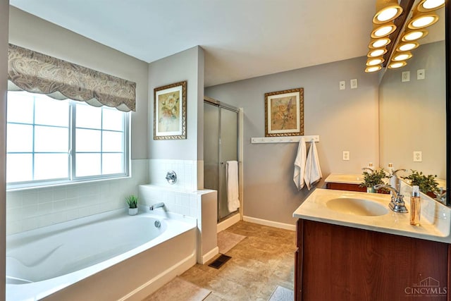4623 Steeplechase Dr, Batavia Twp, OH 45103 - full bathroom with a bath, a shower stall, double vanity, and a chandelier