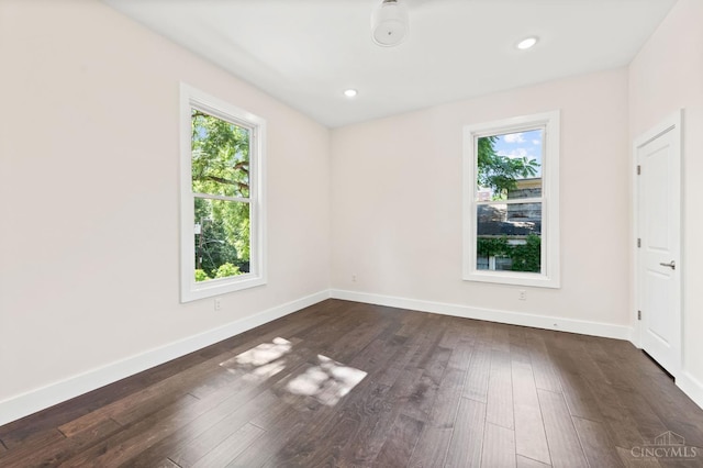 2241 Kemper Ln, Cincinnati, OH 45206 - unfurnished room with plenty of natural light, dark wood-style flooring, and recessed lighting