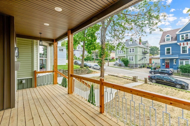 2241 Kemper Ln, Cincinnati, OH 45206 - wooden porch with a residential view