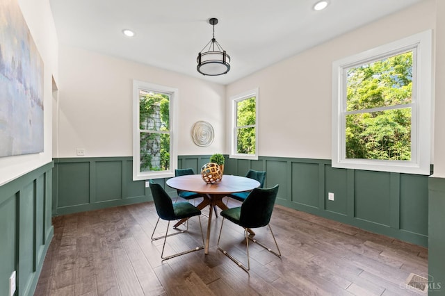2241 Kemper Ln, Cincinnati, OH 45206 - dining room featuring wainscoting, a decorative wall, wood finished floors, and recessed lighting