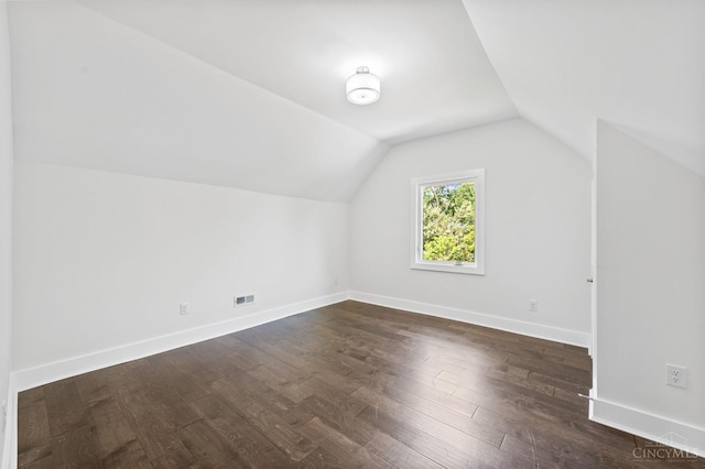 2241 Kemper Ln, Cincinnati, OH 45206 - additional living space with vaulted ceiling and dark wood finished floors
