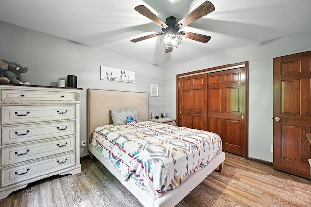 11545 Deer Trace Ln, Harrison Twp, OH 45030 - bedroom featuring a closet, light wood-style floors, and a ceiling fan