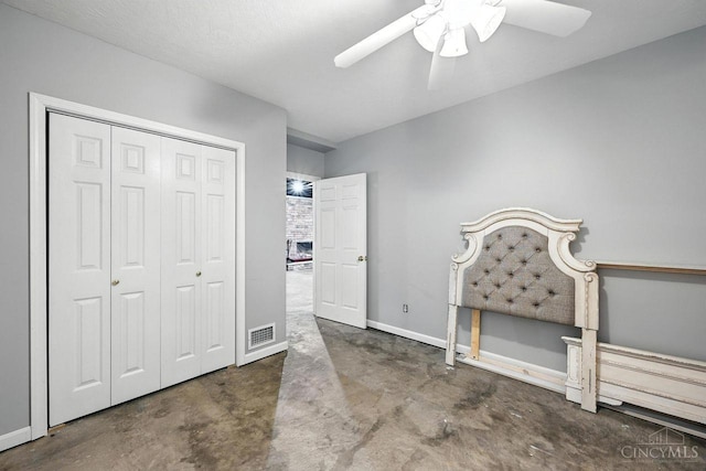 11545 Deer Trace Ln, Harrison Twp, OH 45030 - unfurnished bedroom featuring concrete floors, a closet, and ceiling fan