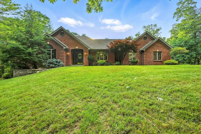 11545 Deer Trace Ln, Harrison Twp, OH 45030 - view of front facade with brick siding and a front lawn