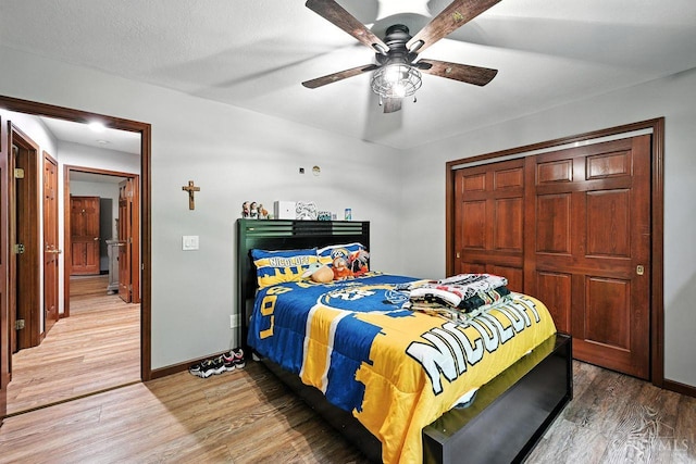 11545 Deer Trace Ln, Harrison Twp, OH 45030 - bedroom featuring wood finished floors, ceiling fan, and a closet