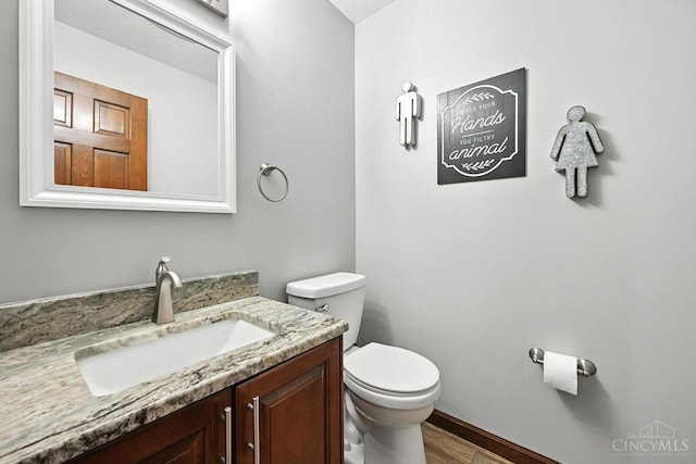 11545 Deer Trace Ln, Harrison Twp, OH 45030 - half bathroom featuring vanity and wood finished floors