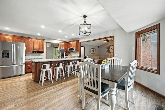 11545 Deer Trace Ln, Harrison Twp, OH 45030 - dining room with light wood-type flooring, recessed lighting, a chandelier, and ceiling fan
