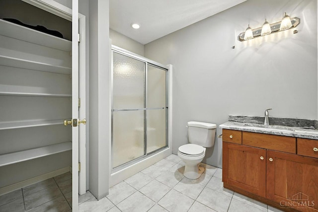 11545 Deer Trace Ln, Harrison Twp, OH 45030 - bathroom featuring a shower stall, vanity, and tile patterned floors