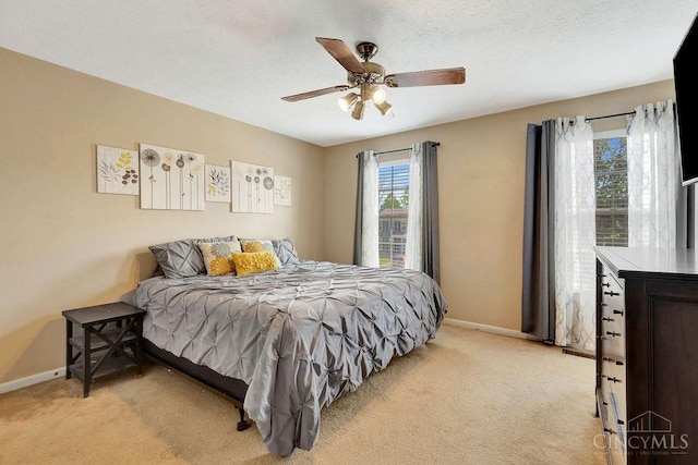 1165 Mcguffey Ln, Union Twp, OH 45103 - bedroom featuring light carpet and a ceiling fan