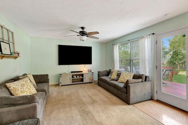 1165 Mcguffey Ln, Union Twp, OH 45103 - living room featuring ceiling fan, carpet, and a textured ceiling
