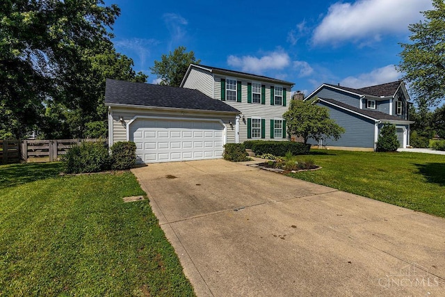 1165 Mcguffey Ln, Union Twp, OH 45103 - view of front facade with a garage and concrete driveway