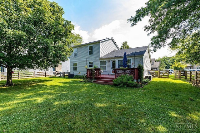 1165 Mcguffey Ln, Union Twp, OH 45103 - back of property with a fenced backyard and a deck