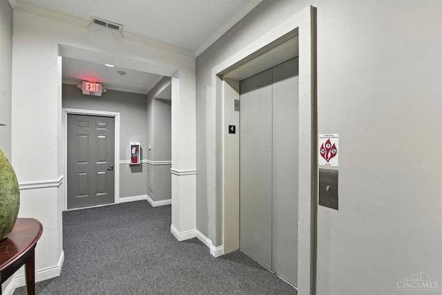 252 Stetson St Unit 403, Cincinnati, OH 45219 - hallway featuring elevator, dark colored carpet, and ornamental molding