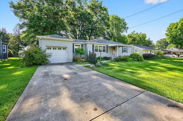 10410 Maria Ave, Springfield Twp, OH 45231 - ranch-style home featuring an attached garage, driveway, and a front lawn