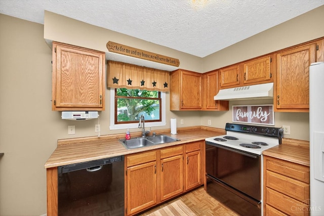 90 Lorelei Dr, Perry Twp, OH 45118 - kitchen featuring white appliances, under cabinet range hood, light countertops, a textured ceiling, and brown cabinets