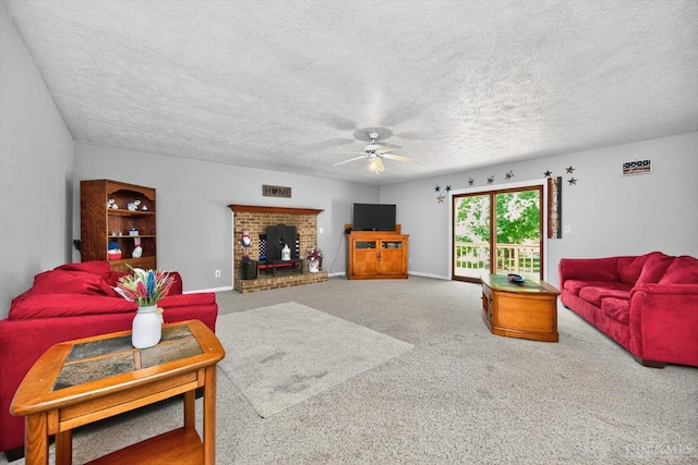 90 Lorelei Dr, Perry Twp, OH 45118 - living area with a ceiling fan, a textured ceiling, carpet floors, and a brick fireplace