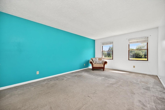 90 Lorelei Dr, Perry Twp, OH 45118 - empty room featuring carpet and a textured ceiling