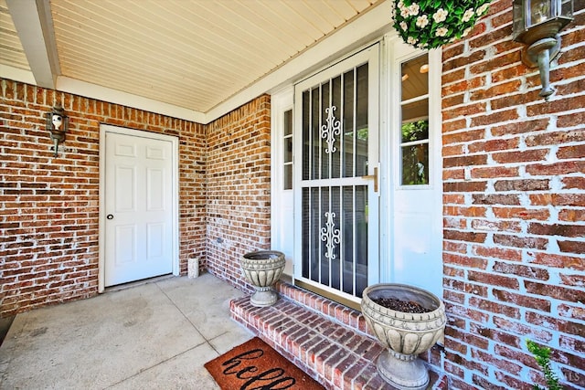 90 Lorelei Dr, Perry Twp, OH 45118 - view of exterior entry featuring brick siding and covered porch