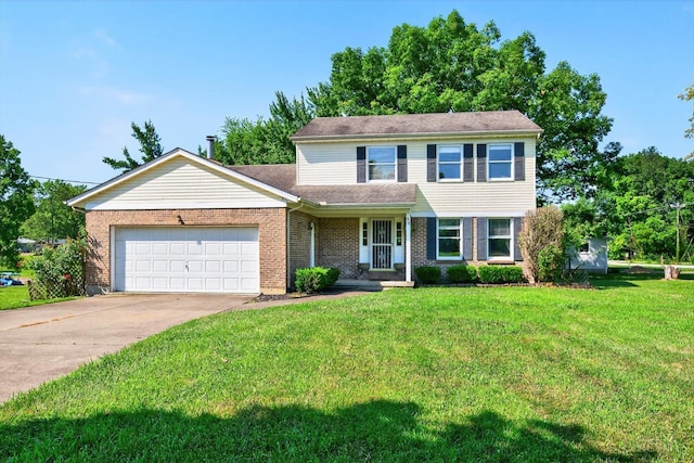 90 Lorelei Dr, Perry Twp, OH 45118 - view of front of property with a garage, a front yard, driveway, and brick siding