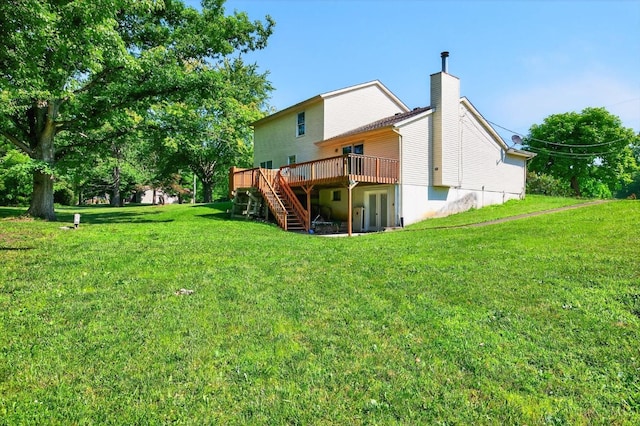 90 Lorelei Dr, Perry Twp, OH 45118 - view of grassy yard featuring a wooden deck and stairs