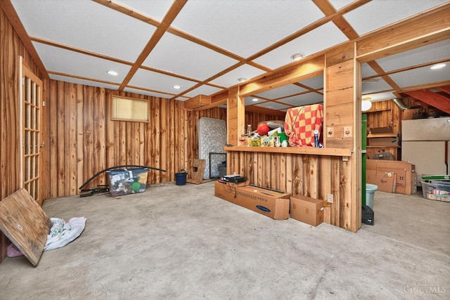 90 Lorelei Dr, Perry Twp, OH 45118 - unfurnished living room featuring concrete flooring, recessed lighting, and wood walls