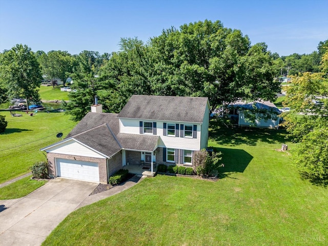 90 Lorelei Dr, Perry Twp, OH 45118 - colonial-style house with a garage, a front lawn, and concrete driveway