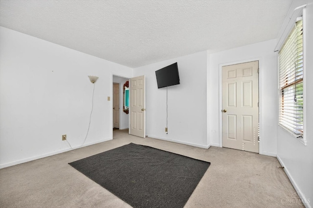 90 Lorelei Dr, Perry Twp, OH 45118 - unfurnished room featuring carpet flooring and a textured ceiling