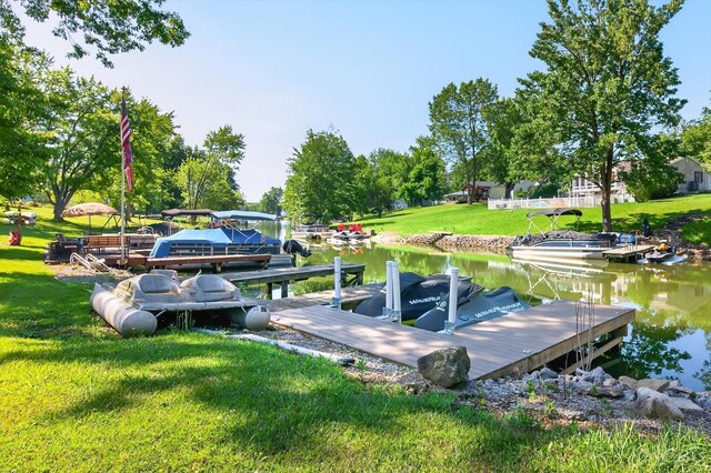 90 Lorelei Dr, Perry Twp, OH 45118 - dock area with a lawn and a water view