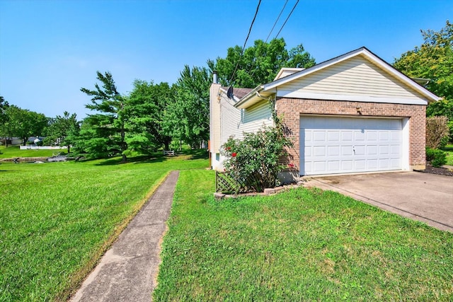 90 Lorelei Dr, Perry Twp, OH 45118 - view of home's exterior featuring concrete driveway, a yard, a garage, brick siding, and a chimney