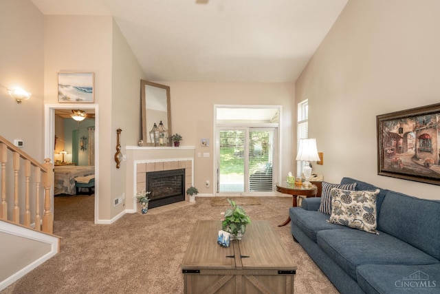 4247 Fieldsedge Dr, Mason, OH 45040 - living room with carpet floors, a tile fireplace, and a ceiling fan