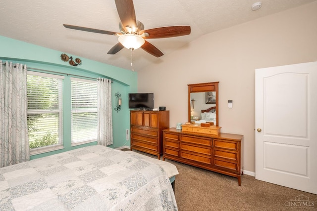 4247 Fieldsedge Dr, Mason, OH 45040 - bedroom with lofted ceiling, multiple windows, carpet flooring, ceiling fan, and a textured ceiling