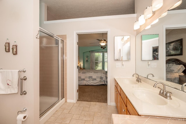 4247 Fieldsedge Dr, Mason, OH 45040 - full bath with ensuite bath, a stall shower, double vanity, ceiling fan, and ornamental molding