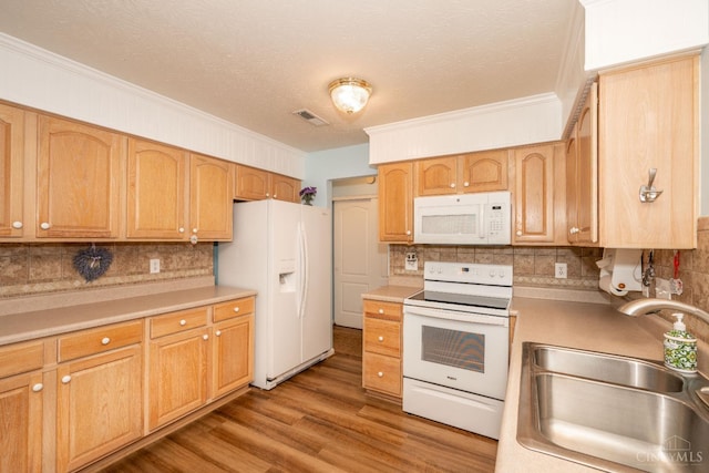 4247 Fieldsedge Dr, Mason, OH 45040 - kitchen with white appliances, backsplash, ornamental molding, light countertops, and wood finished floors