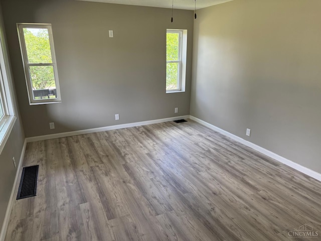 569 Beissinger Rd, Saint Clair Twp, OH 45013 - empty room with baseboards and wood finished floors