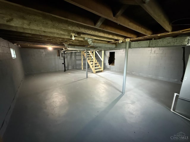 569 Beissinger Rd, Saint Clair Twp, OH 45013 - basement featuring stairway