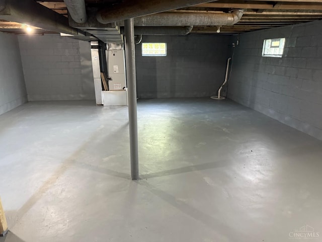 569 Beissinger Rd, Saint Clair Twp, OH 45013 - below grade area with heating unit and healthy amount of natural light
