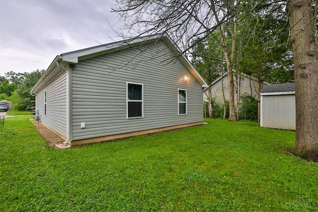 2465 Wilson Ave, Cincinnati, OH 45231 - view of home's exterior with a lawn and an outdoor structure
